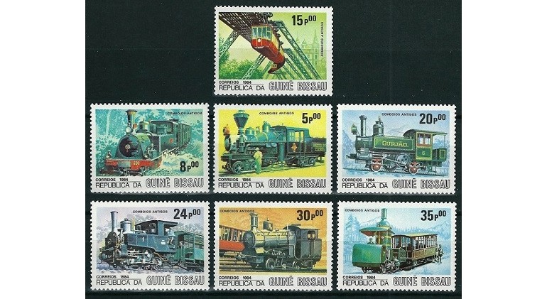 GUINEA BISSAU 1984 - TRENURI, LOCOMOTIVE - SERIE DE 7 TIMBRE - NESTAMPILATA - MLH (1 sau 2 timbre prezinta pete superficiale maronii pe spate) / trenuri36